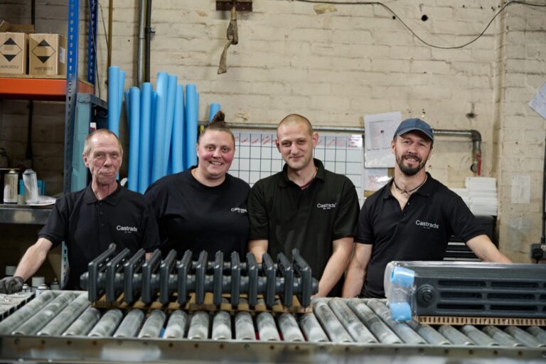 Cast iron radiator factory packaging team, Stockport, UK
